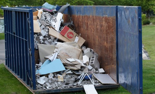 Before and after garden clearance in a Wimbledon home