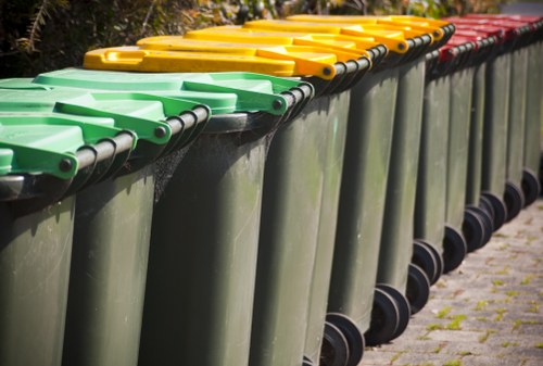 Professional waste clearance team working in a garden