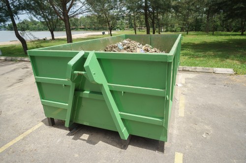 Various garden waste being cleared from a garden